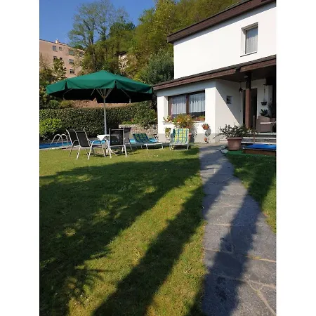 In Bifamiliare Con Piscina Pura